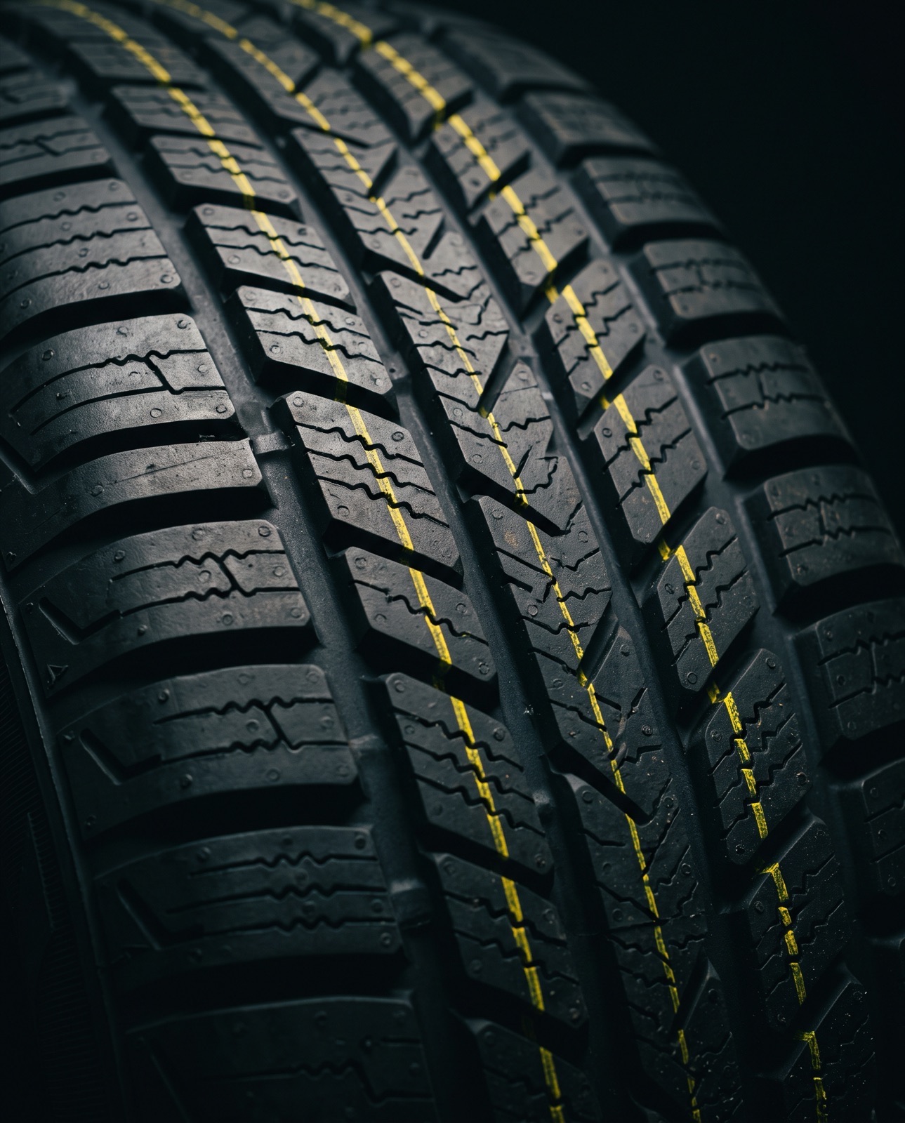 Close-up of a new all-season tire tread pattern